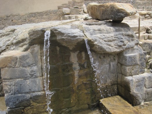 Another bathing area at the base of the temple steps.