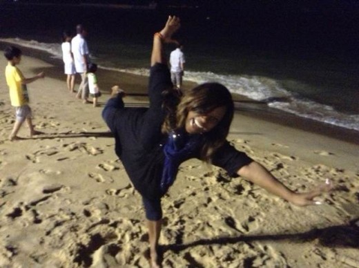 Having fun on the beach at night.