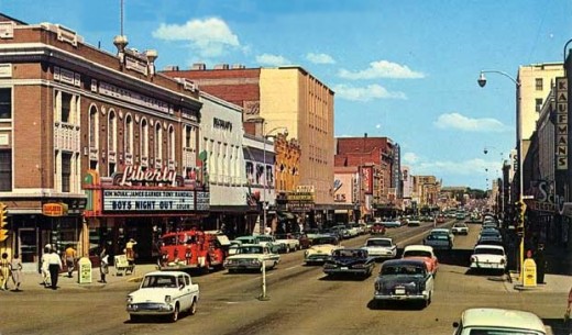 Central Avenue, Great Falls, Montana, 1962. Look close, on the right side, and you'll see Kaufman's sign. 