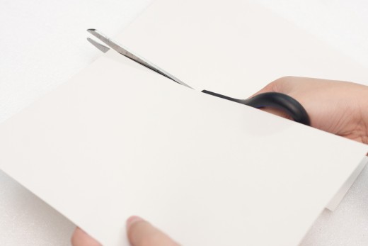Cut your white cardstock or construction paper twice as large as you want your card.  You are going to fold it in half and that's the size your card will be.