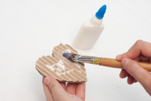Paint one side of the entire heart with white craft glue.  Make sure the glue is spread evenly