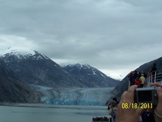 NOTICE THE DIRT THE GLACIER BROUGHT WITH IT DOWN THE MOUNTAIN