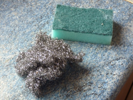You see the actual scourer and sponge I used. The scourer had been used previously for pans etc so it doesn't reflect the amount of scrubbing I did. The sponge? You can hardly see the dirt. It rinsed down the drain forever...
