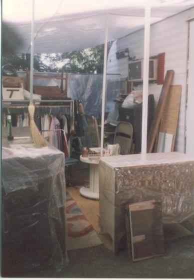 Yard sale stuff on my patio under an awning I made.