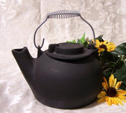 Black cast iron tea kettle