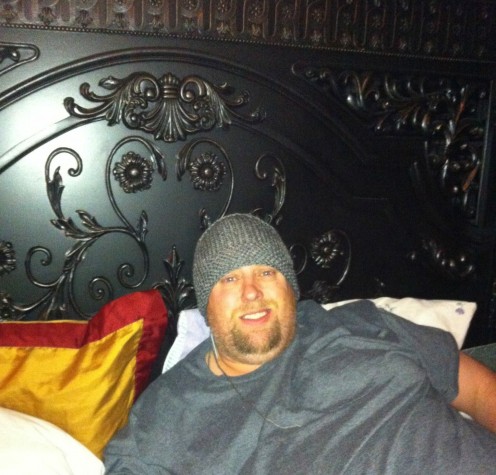 Bryan modeling the beanie hat we knitted together as a team!