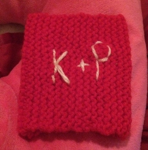 This is the monogrammed coffee cozy I made for my husband from the kitties, King and Princess - hence the K and P. :)