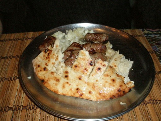 Do not leave without trying the traditional, popular main course meal called Cevapi! Basicaly, it is minced meat sausage (beef, lamb) served on a flatbread with sourcream and onions. 