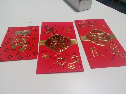 Chinese New Year red envelopes filled with lucky money!