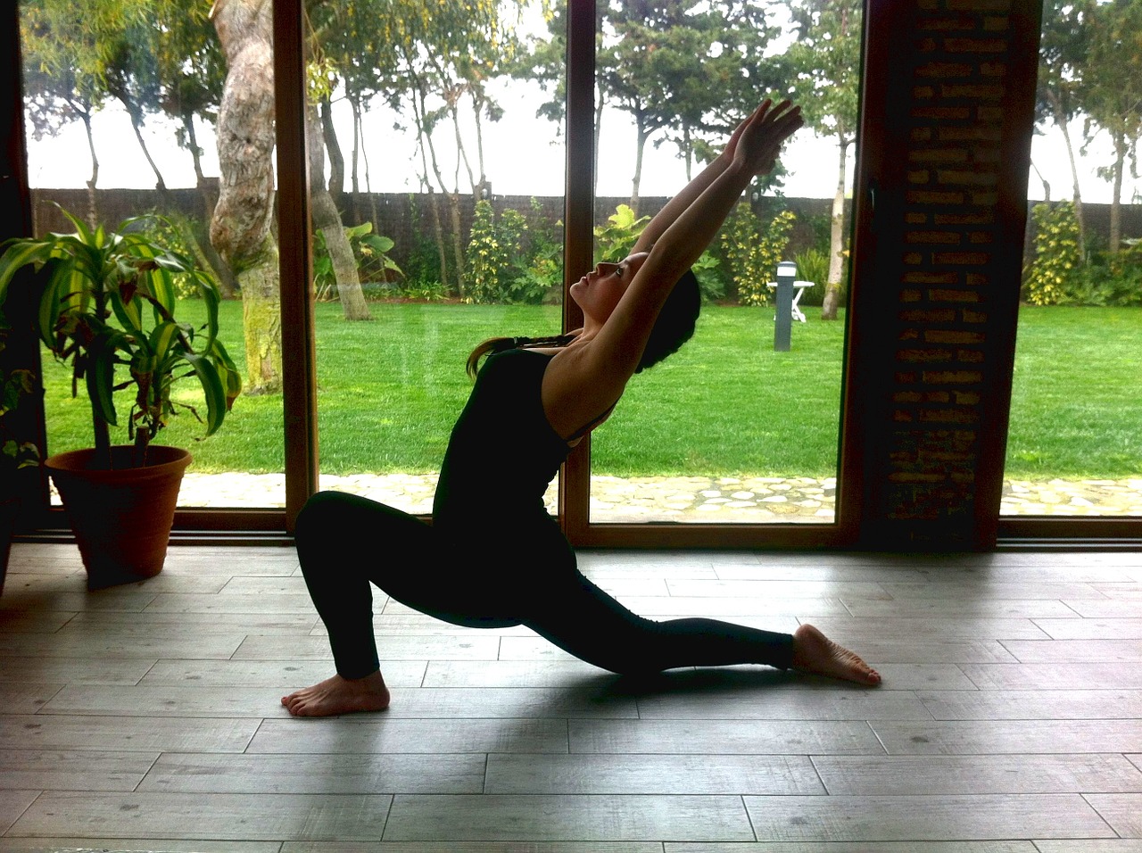 Premium Photo | Fit yogini woman practices yoga asana anjaneyasana