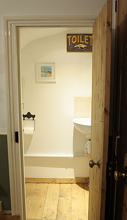 Under-stairs cloakroom 