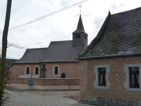 The church of Saint Nicolas of the hamlet of Marchipont which bears the date of its reconstruction (1718).