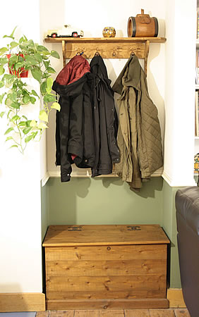 Alcove coat hanger and trunk