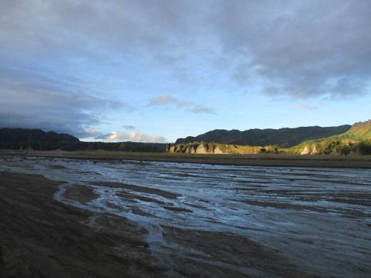 A stream of water flowing through the wasteland.