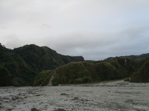 You can see the mountain formations around the river.