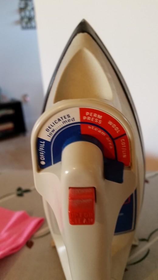The instructions said to use the "cotton" setting on a steam iron.