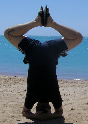 The benefits of headstands go beyond conditioning the neck. They are also a great exercise for balance improvement.