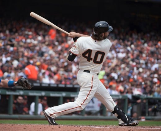 Madison Bumgarner is the pitcher who helps himself while at bat, perhaps more than any other now in Major League Baseball.