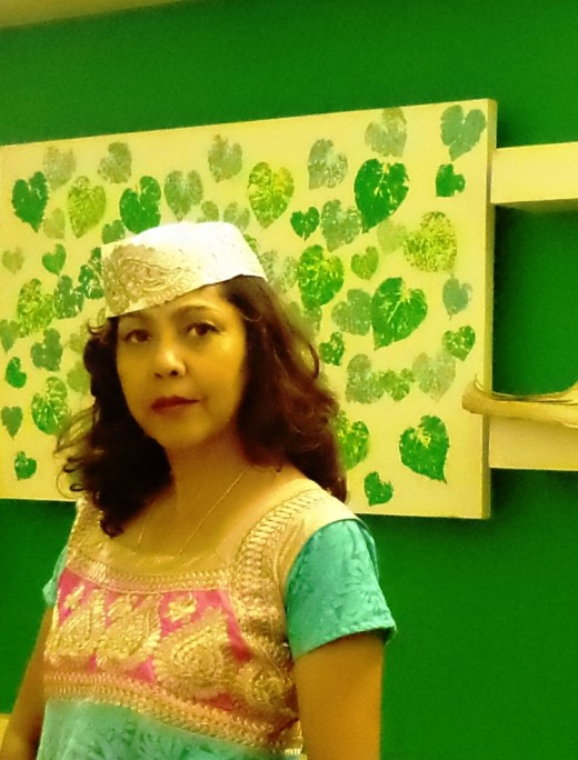 Accessorise Anarkali Kurta with Embellished Gandhi Topi (cap) and Mojra Sandals to Complete the Look.