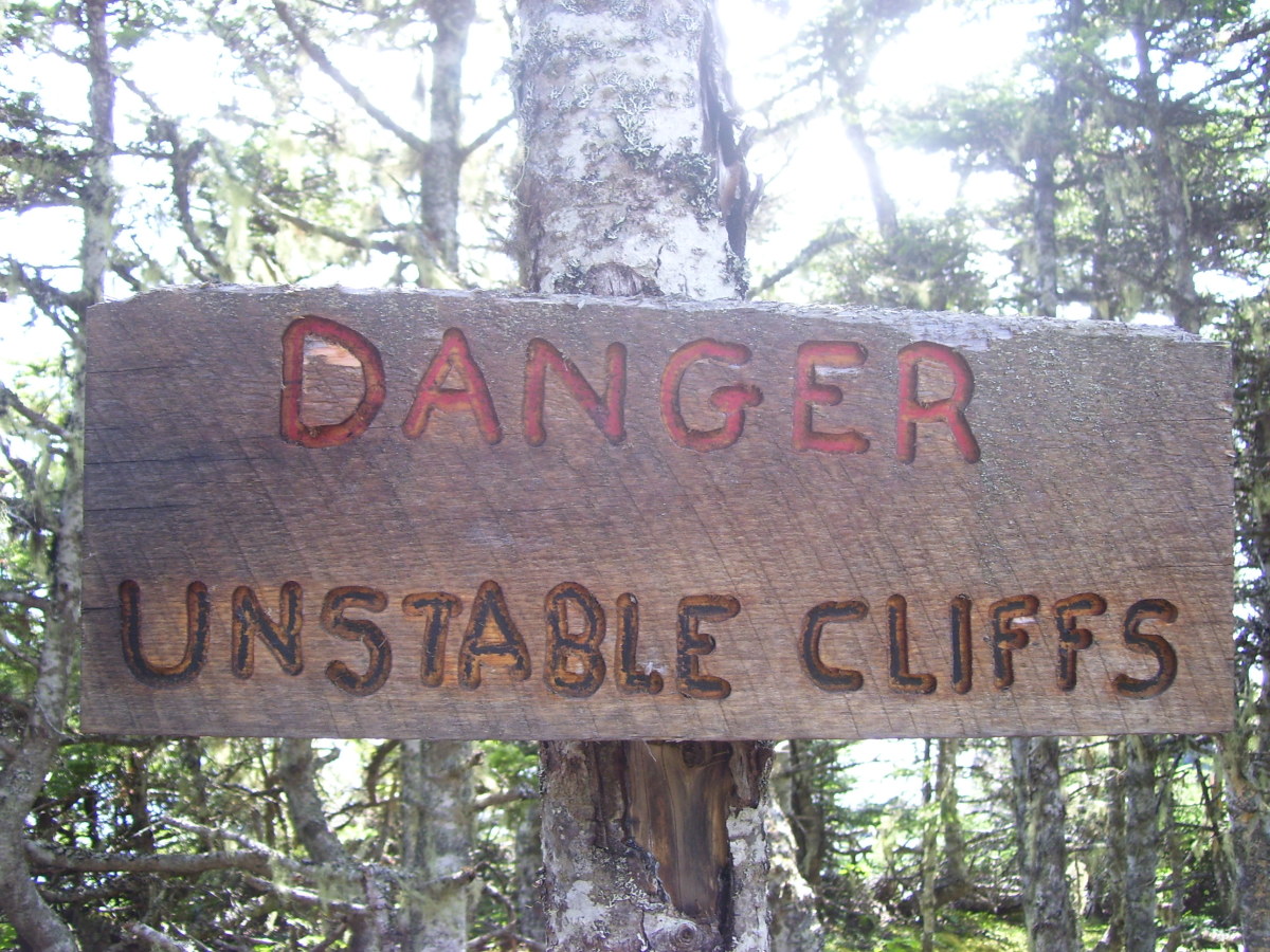 Sign marking danger area. Not a place to stray from the trail.