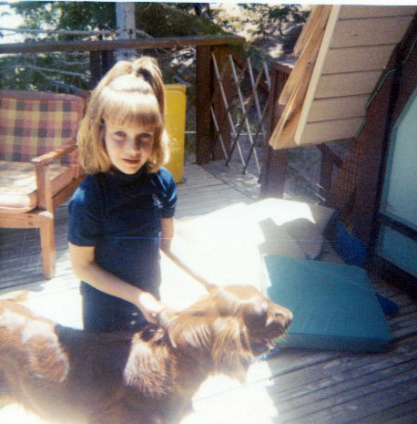 Monaghan and me out on the back porch. Below the porch is the area where I tried to sweep out all the fluff. 
