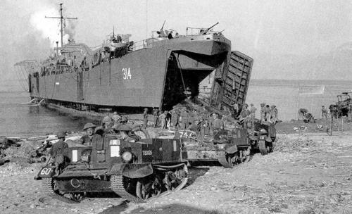 X Corps land scout cars on Salerno beach