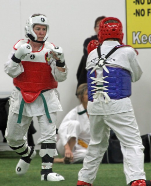 I won my first sparring competition in sudden death with a front jump kick - despite falling on my rear end after executing the kick! :-) See the video below.
