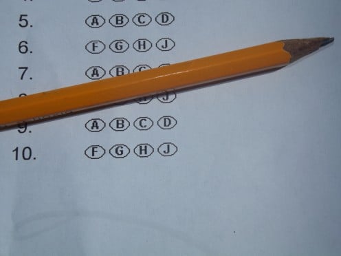 Standardized Test answer sheet and pencil