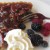 A delicious slice of Pecan Pie with whipped cream, black berries and raspberries was served for dessert. A delicious slice of Pecan Pie with whipped cream, black berries and raspberries was served for dessert.