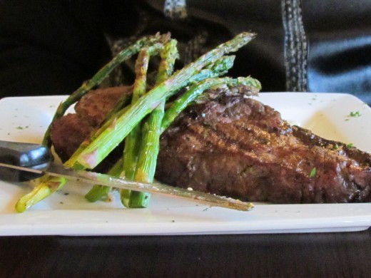 My husband Walker, ordered the New York Strip Steak with asparagus and a glass of red wine.