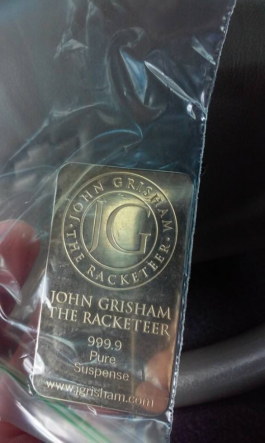 This "John Grisham: The Racketeer" Geo-coin is on a mission to find the West Coast!
