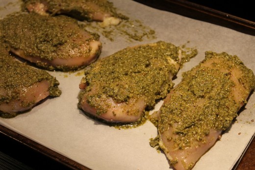 Pesto coated chicken breasts ready for the oven