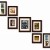 Many picture frames but in various sizes, and all one color. Creating an elegant organized way to display your photos.