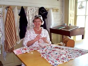 The dressmaker at her craft