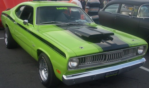 This tangy lime green Plymouth Duster has great lines and roaring muscle car power that won't leave you feeling sour.