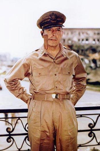 General of the Army Douglas MacArthur smoking his corncob pipe.