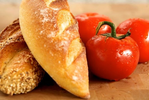 Tomatoes and Bread both contain carbohydrate. Both contribute to blood sugar but in differing amounts.