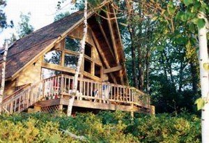 The house is located in a very private, wooded setting, on a small island with a drivable causeway and bridge. 