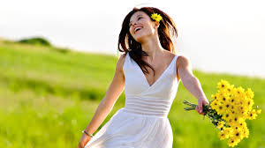 When a girl dances in an open meadow, she is very happy.