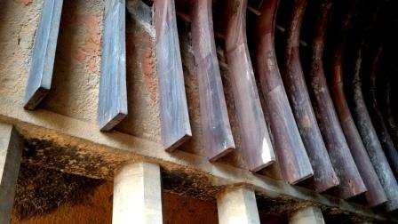 The lower ends of the arch type wooden ribs in the roof of Chaityagriha, Bhaja