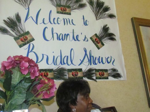  A sign that was created by my nieces Wanisha and Kasia for Chante's bridal shower as my sister Lean looks on. Lean, also gave Chante marital advice because she has been married to her husband Alexander for more than 50 years.