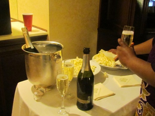 My nephew Mo Bey, husband of my niece Wanisha, who works at the hotel provided as a surprise champagne and popcorn after dinner during our shower weekend.