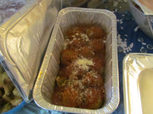Delicious Meatballs, smothered with parmesan  