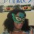 My daughter Chante, wore a mask made of peacock feathers which is her favorite. My daughter Chante, wore a mask made of peacock feathers which is her favorite.