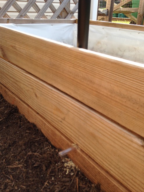 Pipes are covered inside with weed fabric (water can go back and forth but soil will not clog pipes) and a drainage hole is drilled to prevent water-logging.