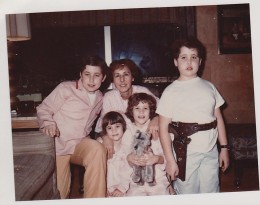 Here we all are sitting with our nanny on the 23rd floor of the UN Plaza, across from the UN Building. What a great place for a kid to grow up, among stars like Johnny Carson and Truman Capote.