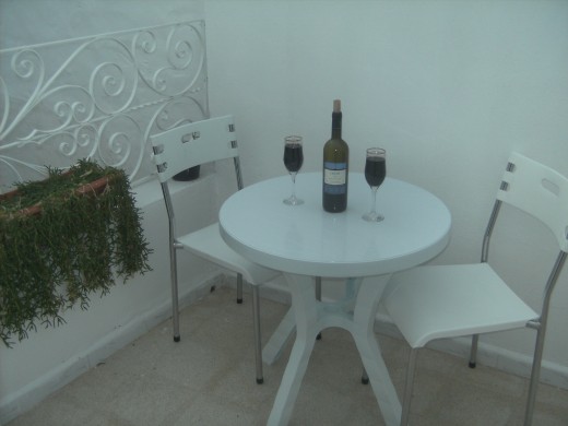 The balcony is a great place to relax in the Mediterranean sunshine and have a glass of wine or two!