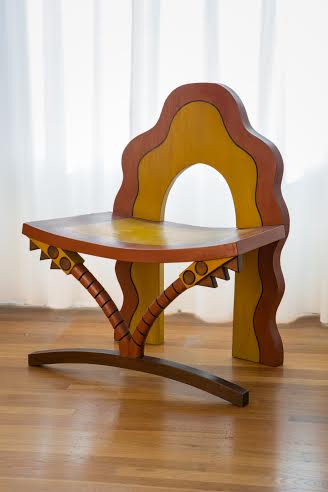 "African Throne"; Carved wood and paint; 30in x24in x 17in. Carved Wood Chair (Three Quarter View)
