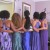 The bridesmaids join together with a quick photo from the back. The bridesmaids join together with a quick photo from the back.