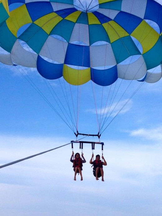 Parasailing above the clear waters of Boracay